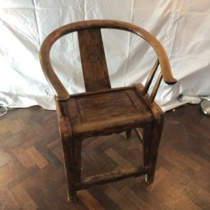 A Wooden Antique Horseshoe Armchair