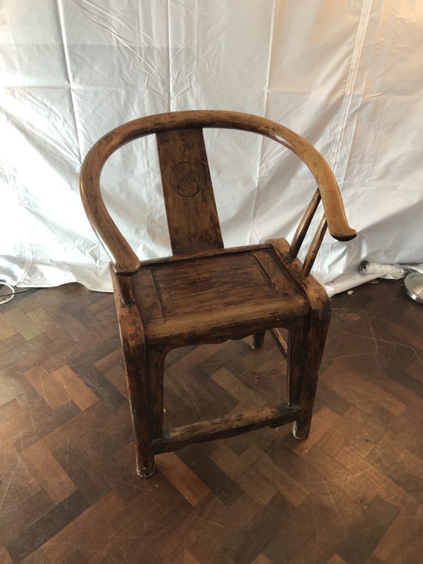 A Wooden Antique Horseshoe Armchair