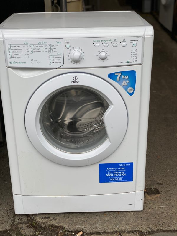 An Indesit Seven Kilo Washing Machine in White