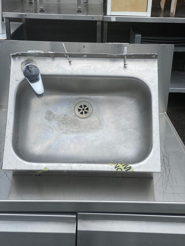A Stainless Steel Kitchen Hand Wash Sink