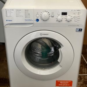 An Indesit Seven Kilo Washing Machine in White Color
