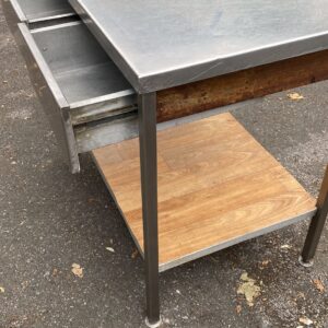 A Stainless Steel Preparation Table With Two Drawers