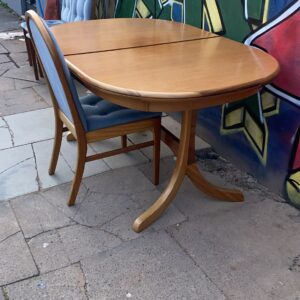Retro 1970s/80s teak extending dining table with three matching chairs that have been upholstered
