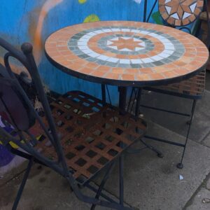 Circular tiled top bistro table with two folding matching chairs, need to be painted as a little project