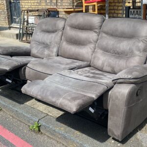 Charcoal grey suede reclining three seater sofa