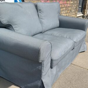 Charcoal grey two seater sofa with removable covers for washing