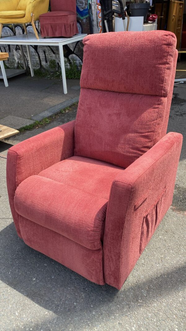 Rise and recline terracotta coloured armchair