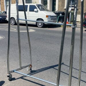 Seven industrial dress rails, middle bar is adjustable, very strong