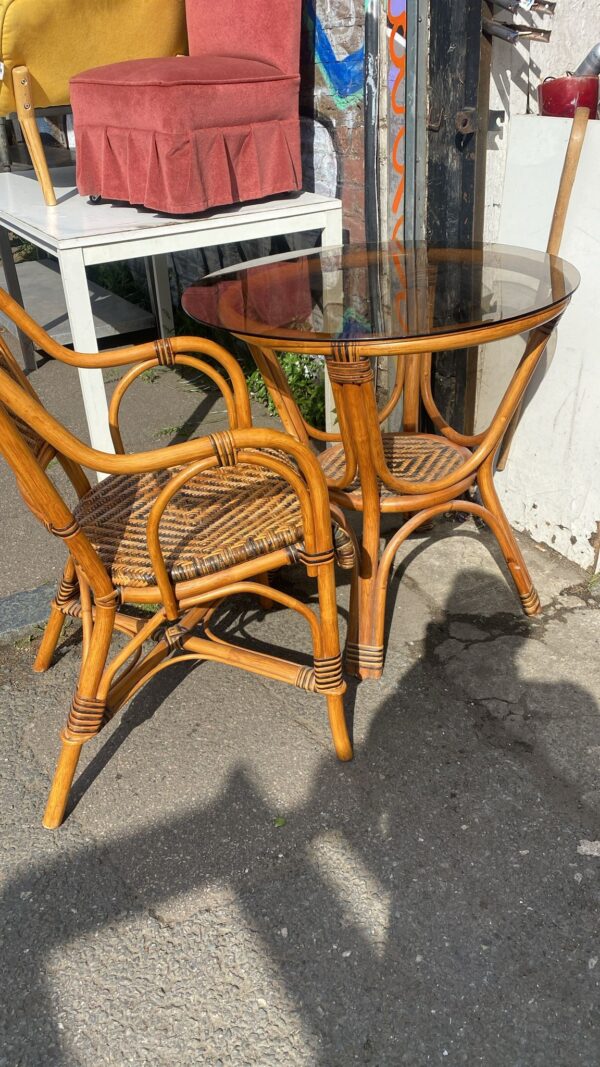 Glass bamboo and wicker circular table with matching chair